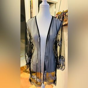 Woman’s Black Lace sheer camisole top